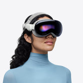 A person wearing Apple Vision Pro spatial computer headset against a clean white background.