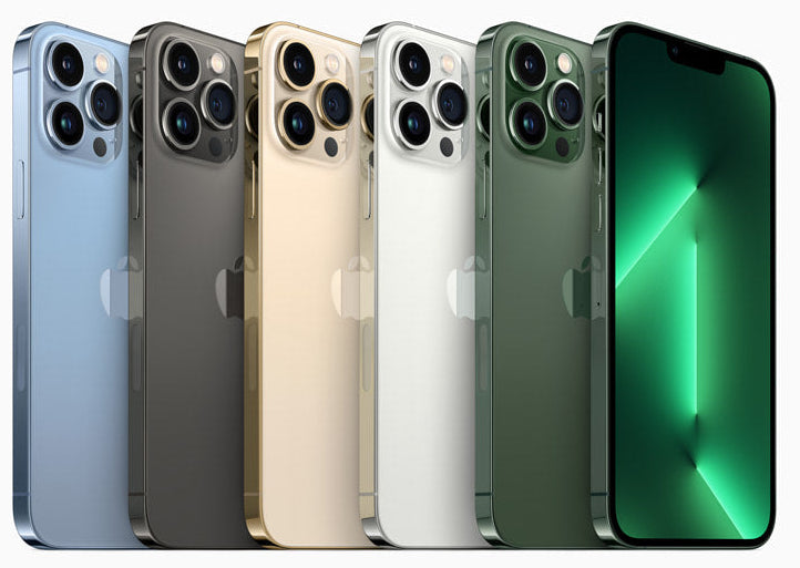 Row of smartphones iphone 13 pro  in various colors with a green screen display with white background.