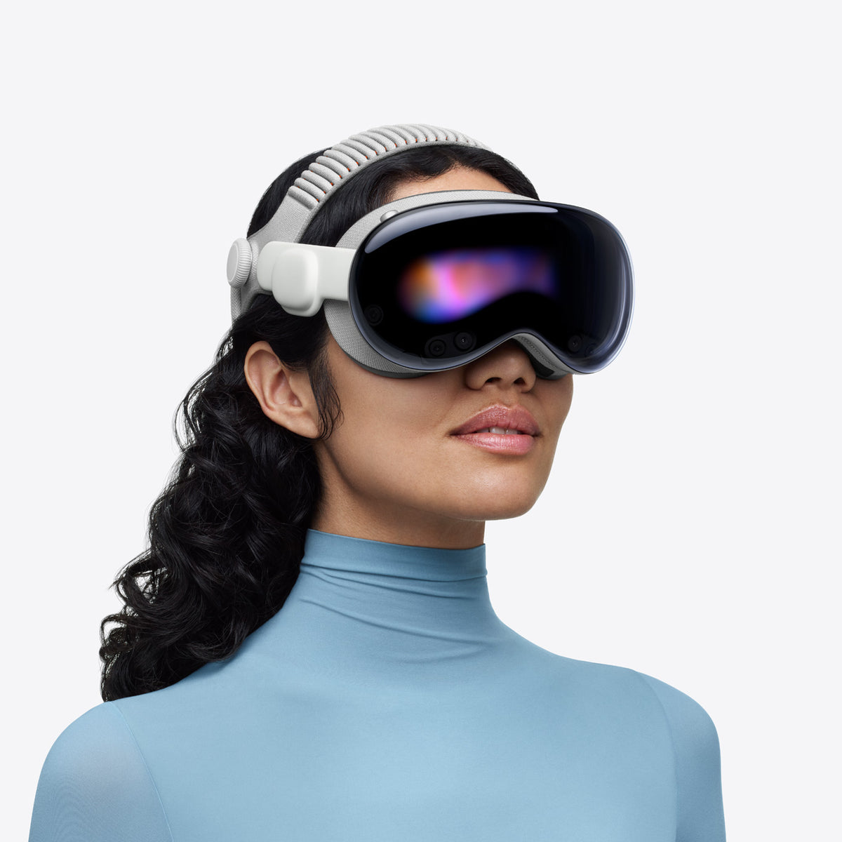 A person wearing Apple Vision Pro spatial computer headset against a clean white background. Apple Vision Pro Spatial Computer 4K 